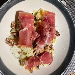 A picture of Blue cheese Pappardelle with toasted Walnut and Serrano ham.