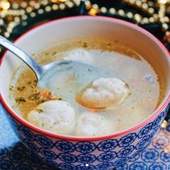 A picture of Soup with chicken meatballs.