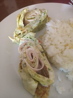 Una foto de Rollo de calabacín relleno