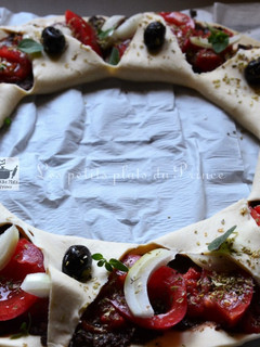 Une photo de Tarte couronne à la tomate