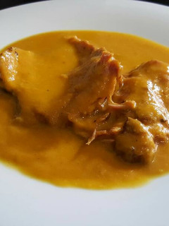 Una foto de Redondo de Cerdo en salsa amarilla