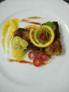 A picture of Pan fried chicken with Maltaise sauce.