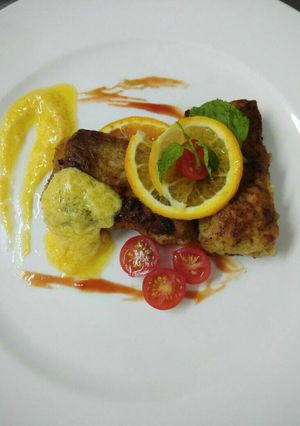 A picture of Pan fried chicken with Maltaise sauce.