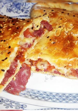 صورة لوصفة كالزون بالبسطرمة