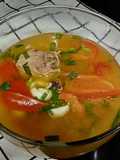 Canh cà chua nấu sườn mực chua cay
