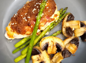 A picture of Keto, low calorie chicken cheese and bacon with mushrooms and asparagus.😋😋. Tahini & soy paste.