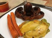 Una foto de pulpo a la parrilla
