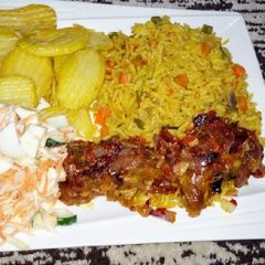 Fried rice,chips,coleslow with pp chicken A picture of Fried rice,chips,coleslow with pp chicken.