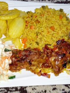 A picture of Fried rice,chips,coleslow with pp chicken.