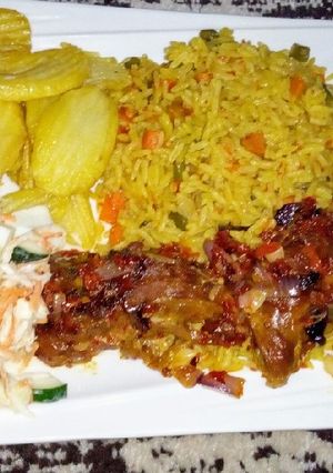 A picture of Fried rice,chips,coleslow with pp chicken.