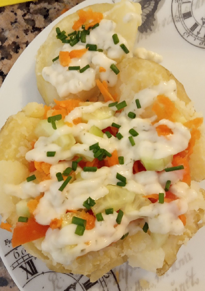 Una foto de Patata asada, rellena de verduras