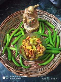 A picture of Green chilli with karonde.