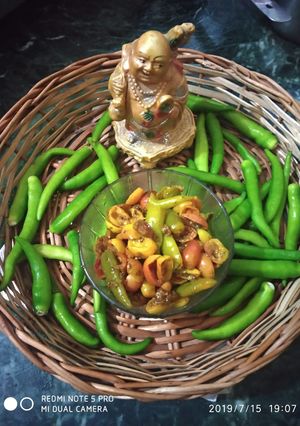 A picture of Green chilli with karonde.