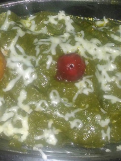 A picture of Golden Balls in Hariyali gravy.