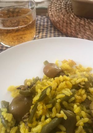 Una foto de Arroz seco con sepias mini y verduras