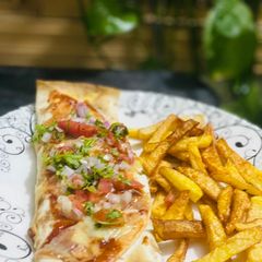 A picture of Shami kabab salsa wraps.