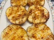 Una foto de patatas para acompañar asado