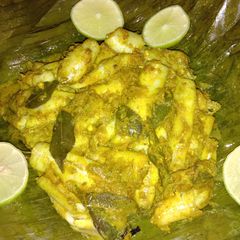 Steamed small fish in banana leaves A picture of Steamed small fish in banana leaves.