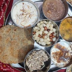 A picture of Kuttu paratha falahari thali.