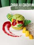 Choux Au Craquelin with mango & mulberry Sauce