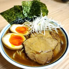 A picture of Grilled pork with sweet soy sauce.