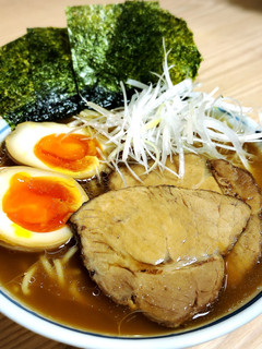 A picture of Grilled pork with sweet soy sauce.