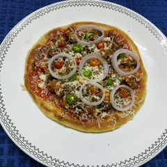 A picture of Tawa Chicken Pizza.