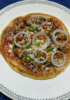 A picture of Tawa Chicken Pizza.