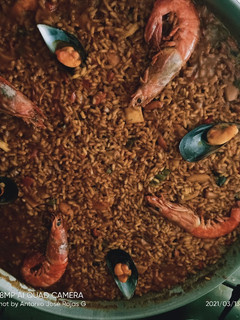 Una foto de Paella