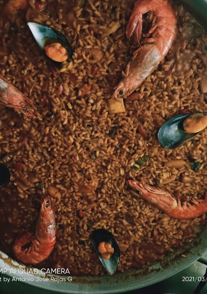 Una foto de Paella