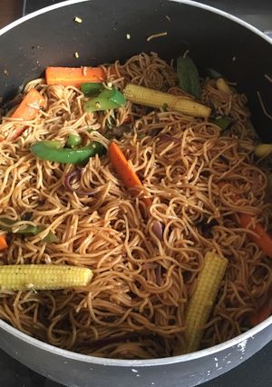 A picture of Noodles with vegetables.