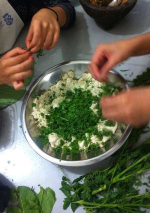 Una foto de Tamalitos de huauzontle en hoja santa