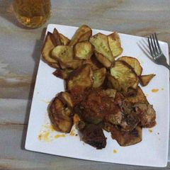 A picture of Chicken Stew serve with Fried sweet potatoes.