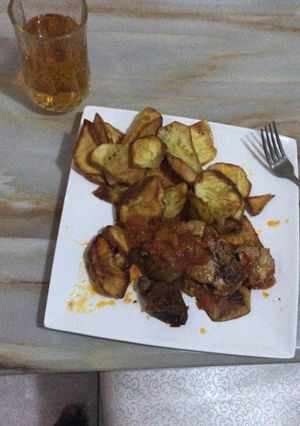 A picture of Chicken Stew serve with Fried sweet potatoes.