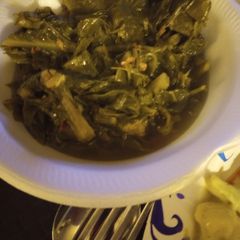A picture of Kale Greens with Bits of the Bovine.