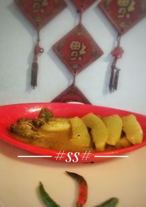 A picture of Papaya with Pabda curry.