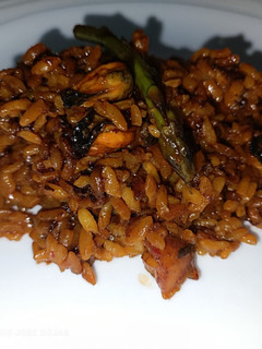 Una foto de Arroz seco con fumet de gamba roja