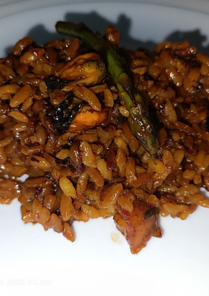 Una foto de Arroz seco con fumet de gamba roja