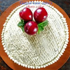 A picture of Plum cake with buttercream.