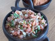Una foto de salsa escabeche