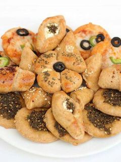 صورة لوصفة 🍕فطاير مشكله بعجينة البر 🍞