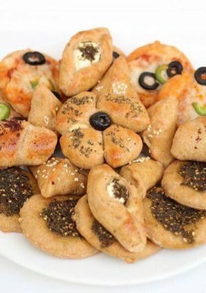 صورة لوصفة 🍕فطاير مشكله بعجينة البر 🍞