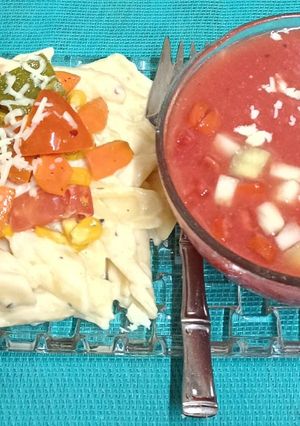 A picture of Summer Special Platter----- Pasta🍝 & Vegetable Casserole served with Watermelon 🍉 Gazpacho.