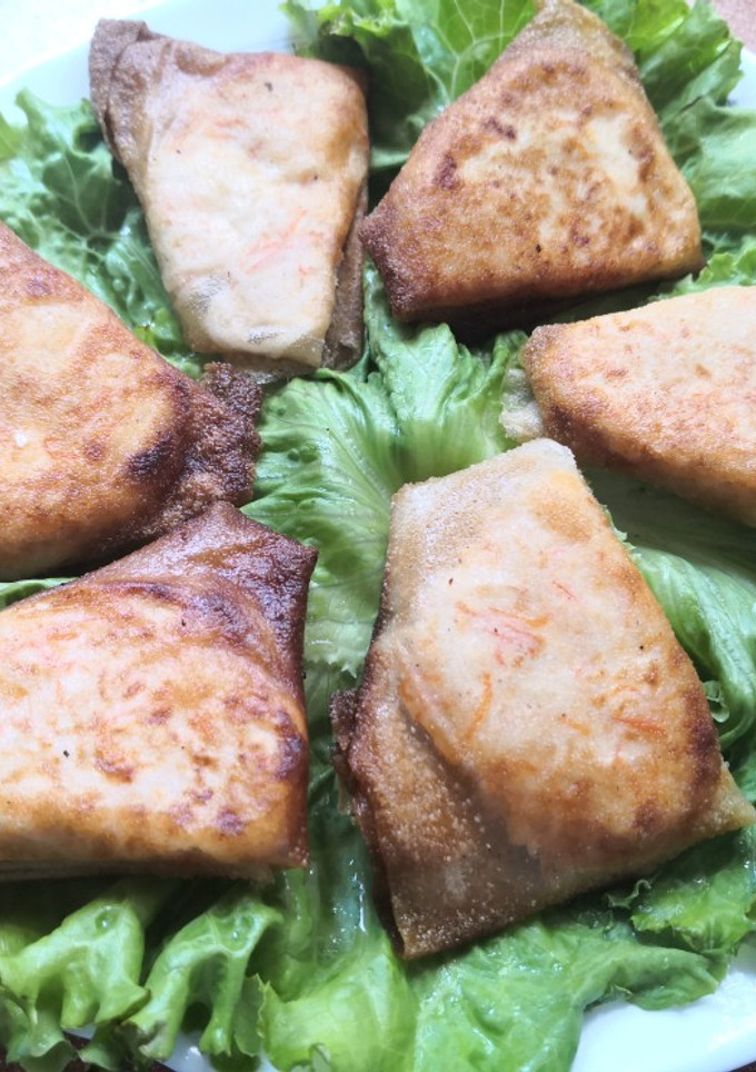 Una foto de Saquitos rellenos de salmón ahumado