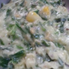 Palak paneer corn in cheese sauce A picture of Palak paneer corn in cheese sauce.