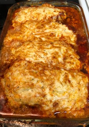 A picture of Stuffed cheesy chicken breasts.