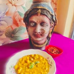 A picture of Dal Dhokli (Dumplings in Lentil Soup).