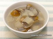 A picture of clams in soup