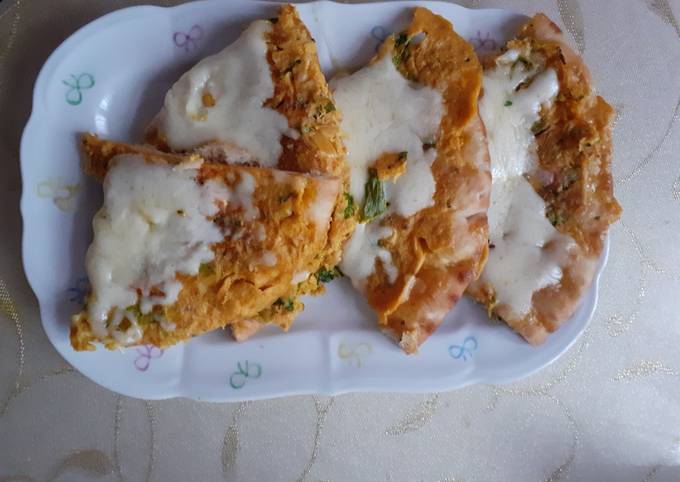 Omelet coated naan with cheese