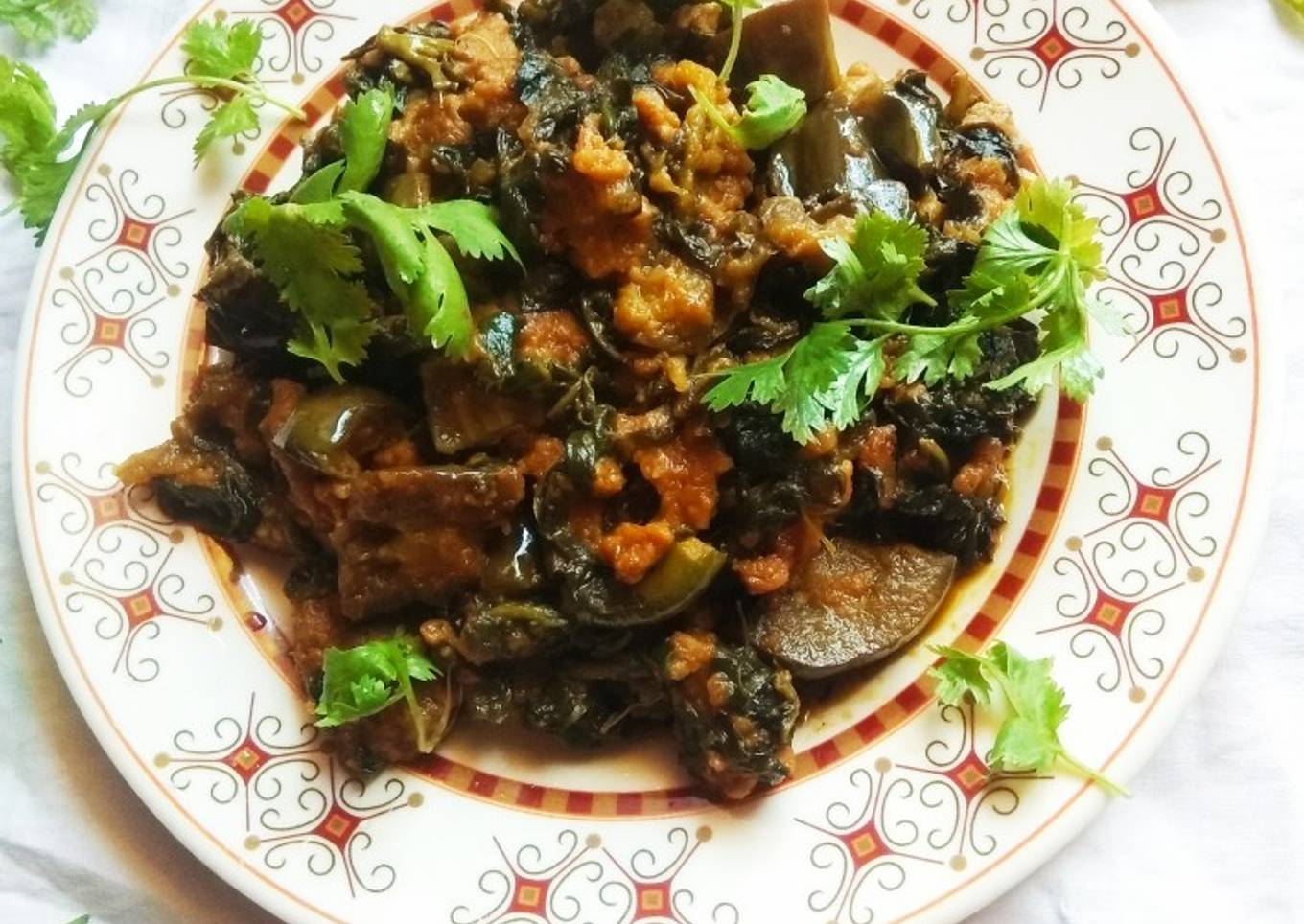 Pui shak ar baigun bodi/malabar spinach brinjal dumpling